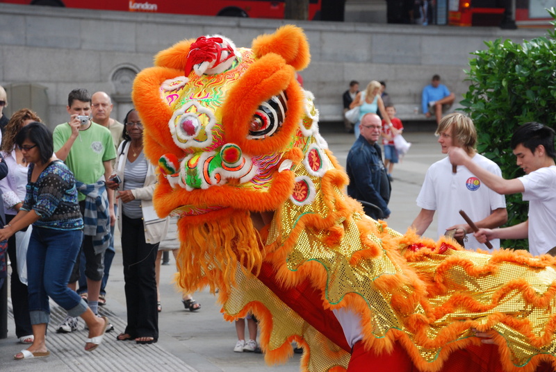 trafalgar square, decoration, lifestyles, chinese, togetherness, dragon, china, real people, leisure activity, representation, childhood, city, men, dancing