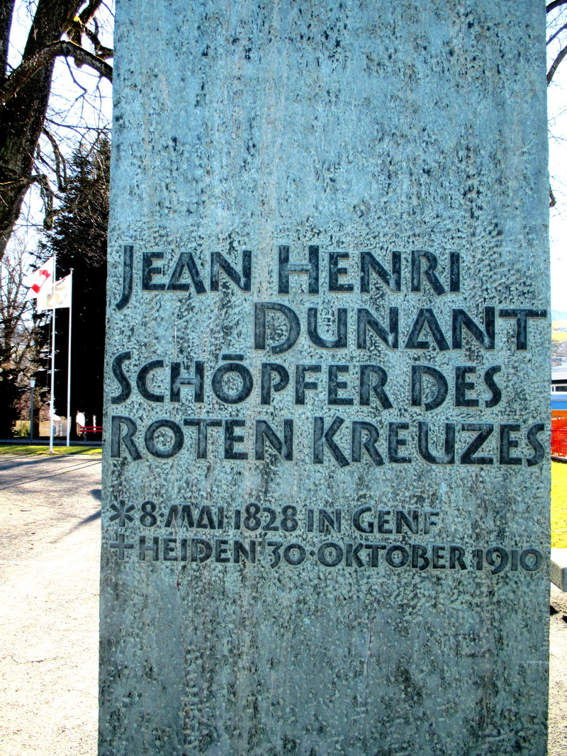 red cross, no people, close-up, croix rouge, founder of red cross, building exterior, nature, heiden appenzeller, jean henri dunant, western script, information