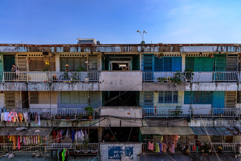 wall, apartment building, day, sunlight, blue, handrail, no people, building exterior, architecture, vietnam, town, urban, neighborhood, view, construction