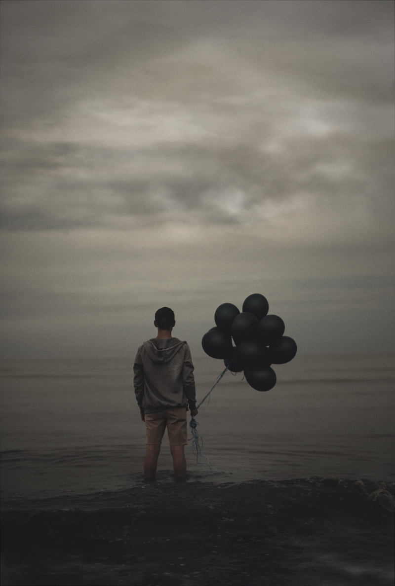 beauty in nature, lifestyles, 4K, balloons, rear view, sky, cloudy, body, full length, sea, cloud, one person, black, horizon over water, real people