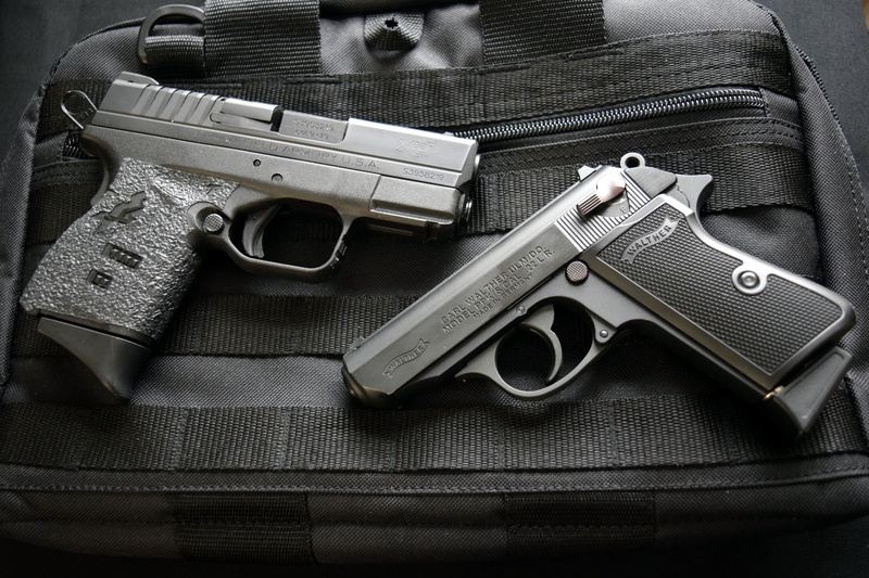 no people, handgun, protection, sign, weapons, warning sign, weapon, aggression, gun, social issues, bag, security, high angle view, indoors, table, Walther PPKS 22