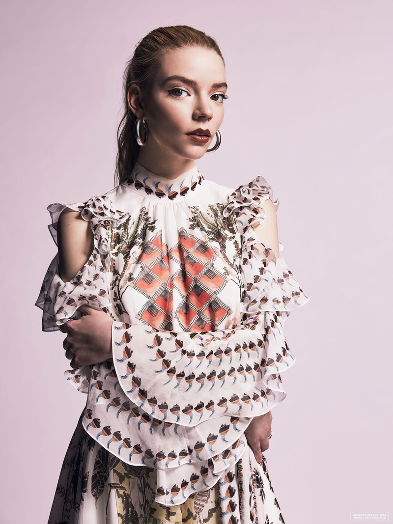 women, hoop earrings, actress, 720P, pink background, gradient, long hair, indoors, blonde, on the floor, Anya Taylor-Joy