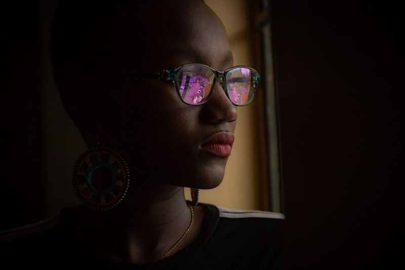 window, sunglasses, mouth open, female model, colors, 5K, eyewear, dark, woman, contemplation, glasses, young adult, standing, human face, profile view