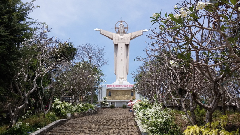 tree, representation, sky, plant, vung tau, religion, sculpture, outdoors, christ, 2K, built structure, place of worship, no people, vietnam, day, art and craft