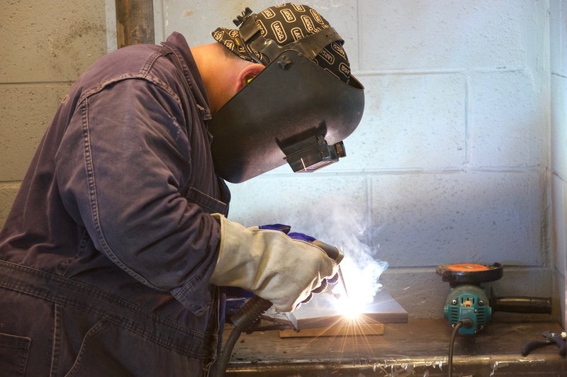 working, bending, clothing, waist up, craftsman, side view, metal, protection, boilermaker, 4K, metal industry, occupation, men, apprentice, real people