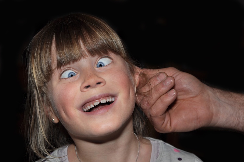 studio shot, black background, person, selected scene, positive emotion, offspring, selected recording, front view, indoors, happiness, innocence, child