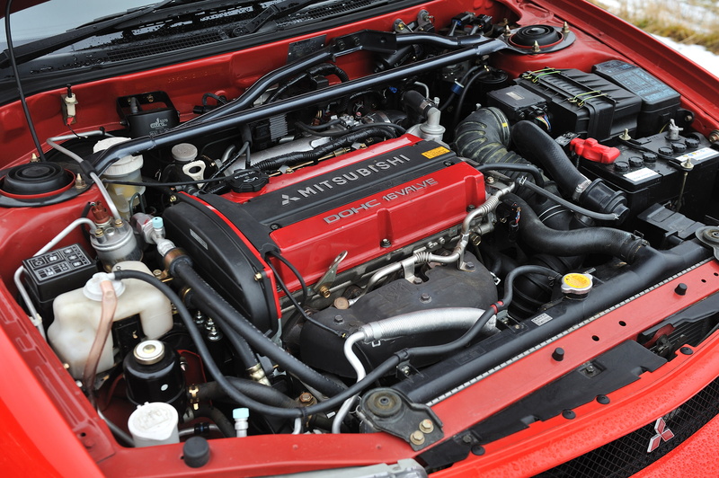 toolbox, car, red, vehicle part, black color, no people, makinen, evolution, land vehicle, open, evo-vi, mode of transportation, day, outdoors, tommi, edition