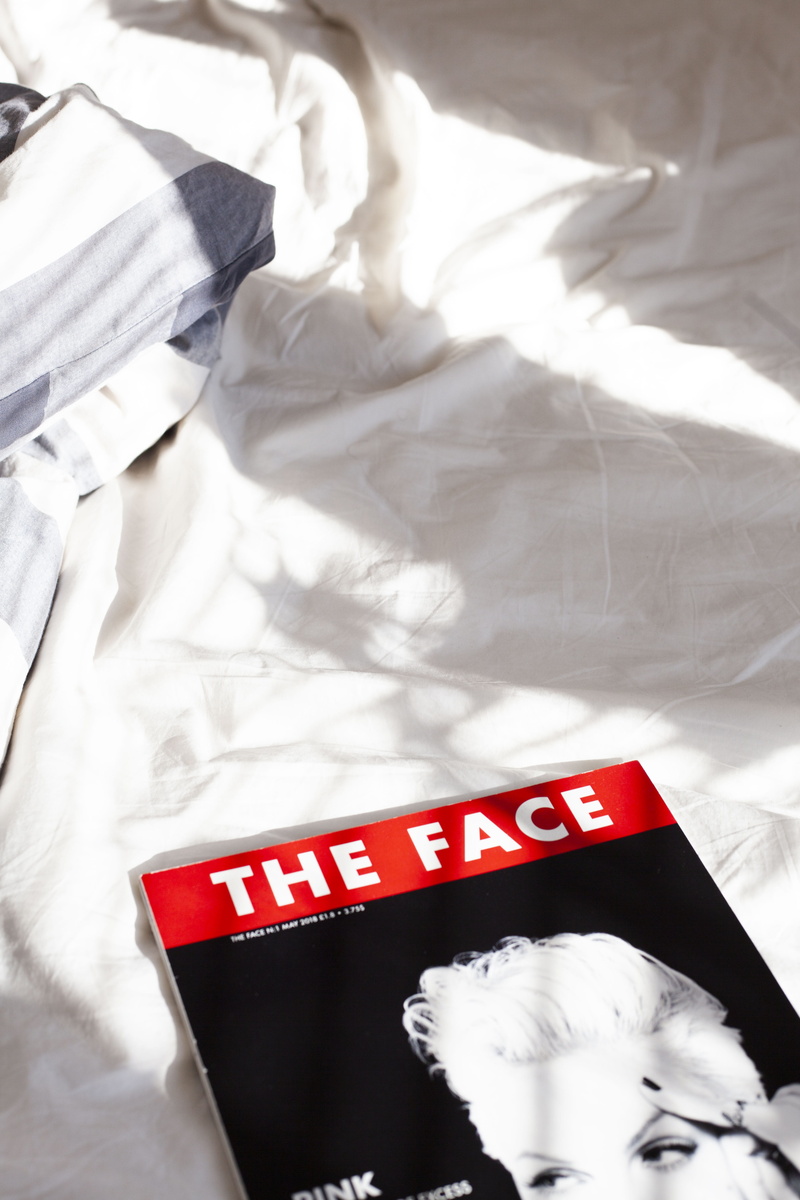 red, western script, textile, healthcare and medicine, close-up, apparel, paper, communication, book, pillow, indoors, magazine, novel, white color, clothing