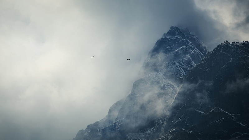 rock - object, rock, formation, day, scenics - nature, bird, covered, snowcapped mountain, mountain peak, cloud - sky, low angle view, winter, sky, outdoors