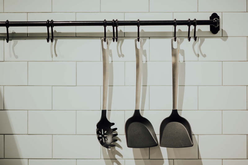 hook, helmet, built structure, overcoat, indoors, 5K, aluminium, flooring, tool, rack, suit, clothing, in a row, still life, broom, set, black, cookware