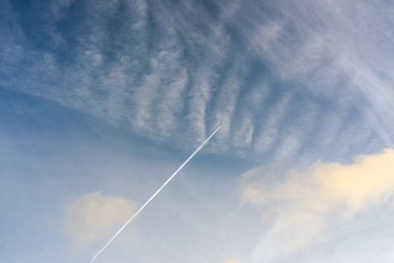 scenics - nature, directly below, motion, day, blue, trail, transportation, sky, tranquil scene, flying, low angle view, jet, shooting, nature, vapor trail
