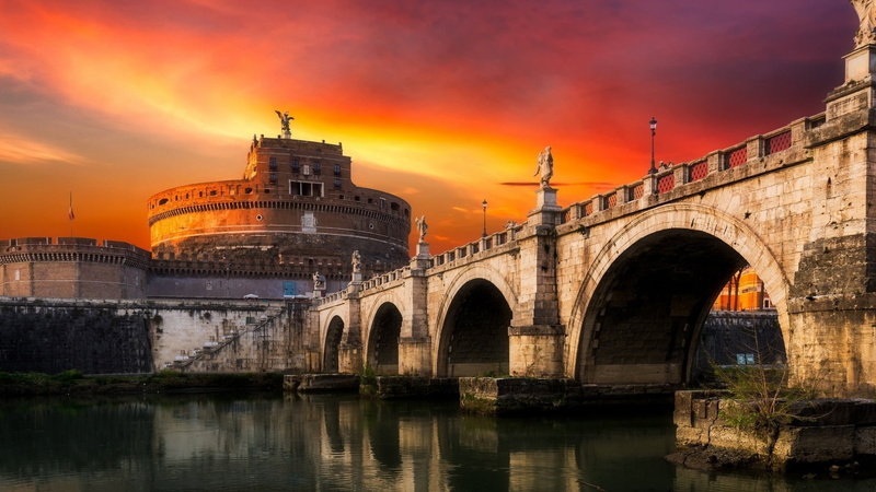 tourist attraction, bridge, water, evening, hadrianeum, cloud - sky, historic site, architecture, travel destinations, river, orange color, tiber, reflection