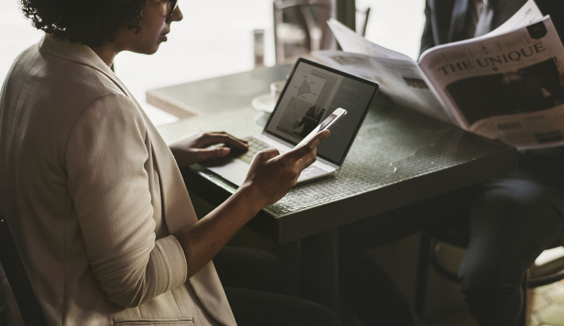 daily news, adult, concentration, working, couple, beautiful, convenience, holding, indoors, financial, global, african american, business person, connection
