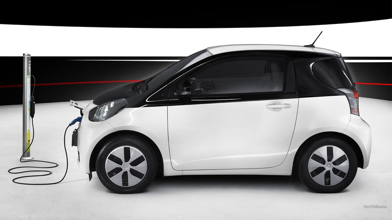 wheel, architecture, business, city, transportation, motion, traffic, stationary, 1080P, motor vehicle, driving, toyota iq car electric cars, mode of transportation