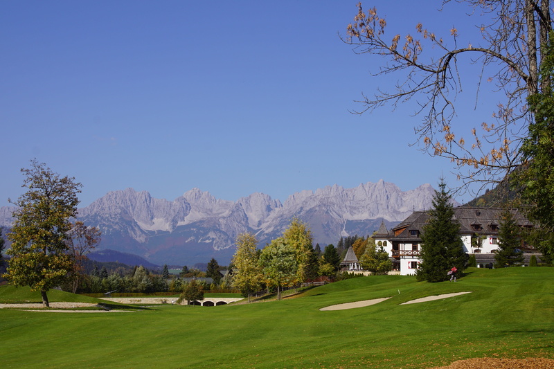 building, summer vacation, golf, golf course, day, kitzbühel, architecture, mountain range, sky, plant, clear sky, snowcapped mountain, house, building exterior