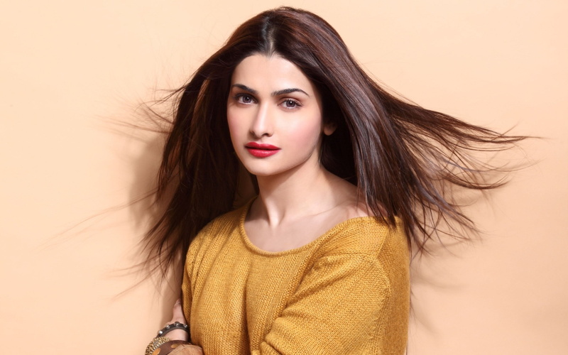 studio shot, headshot, Brunette, Prachi desai, adult, body part, hair, one person, looking at camera, front view, young adult, beauty, wind, Celebrity