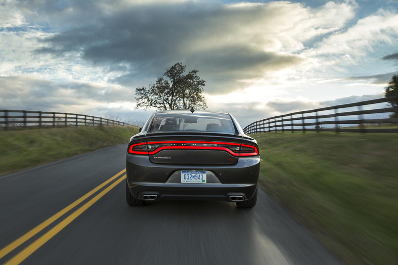 speed, sign, the way forward, dodge, dividing line, no people, road trip, outdoors, motor vehicle, sedan, cloud - sky, on the move, car, road marking, mode of transportation