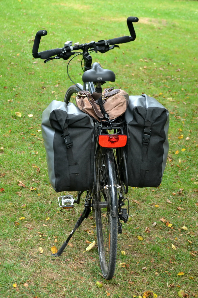 grass, bicycle tour, transportation, bicycle, field, green color, mode of transportation, nature, leisure, bag, wheel, cyclists, container, more, land