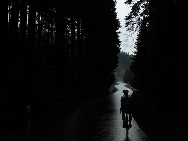 sport, rear view, lifestyles, rain, dark, road, bike, mode of transportation, plant, full length, activity, riding, bicycle, outdoors, cycling, men, transportation