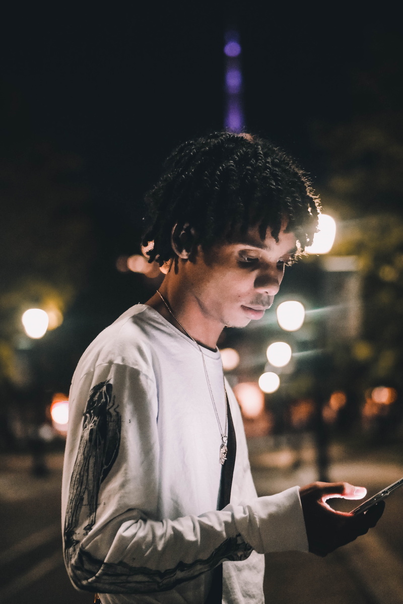 side view, black, young men, man, leisure activity, night, hairstyle, young adult, casual clothing, gtum, park, street, city, black person, holding, portrait
