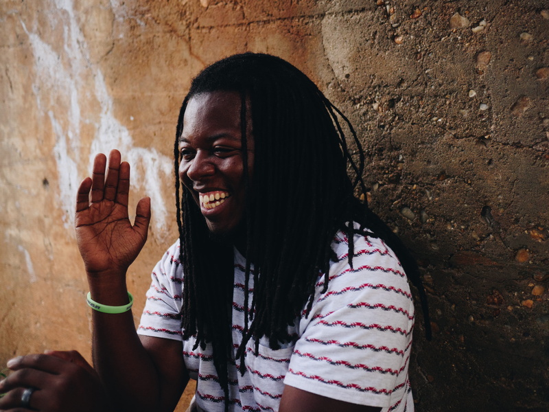 hairstyle, portrait, man, african american, real people, teeth, african american man, casual clothing, hand, laugh, black man, laughter, outdoors, t, bracelet