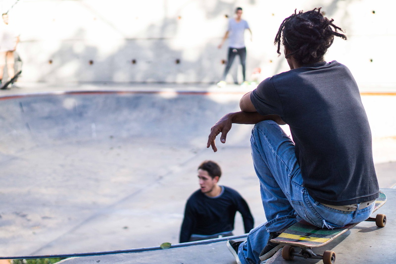 child, incidental people, real people, casual clothing, males, boys, dreads, sports, people, full length, rear view, chill, lifestyles, day, outdoors, skate