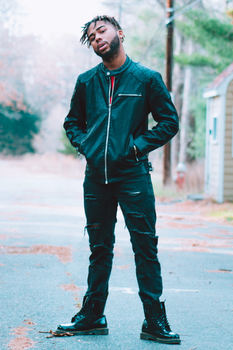 young men, color, real people, men, moody, young adult, dark, leisure activity, one person, jacket, haircut, barrington, braids, modern, standing, glasses
