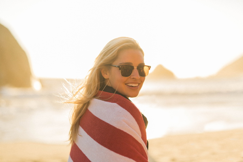 hairstyle, happiness, daytime, sunglasses, near, young women, 5K, woman, blanket, seashore, positive emotion, adult, blonde, red, portrait, sea, wearing