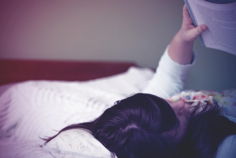 girl, childhood, furniture, hairstyle, blur, innocence, mother, domestic room, book, family, person, adult, indoors, room, focus on foreground, sleep, woman
