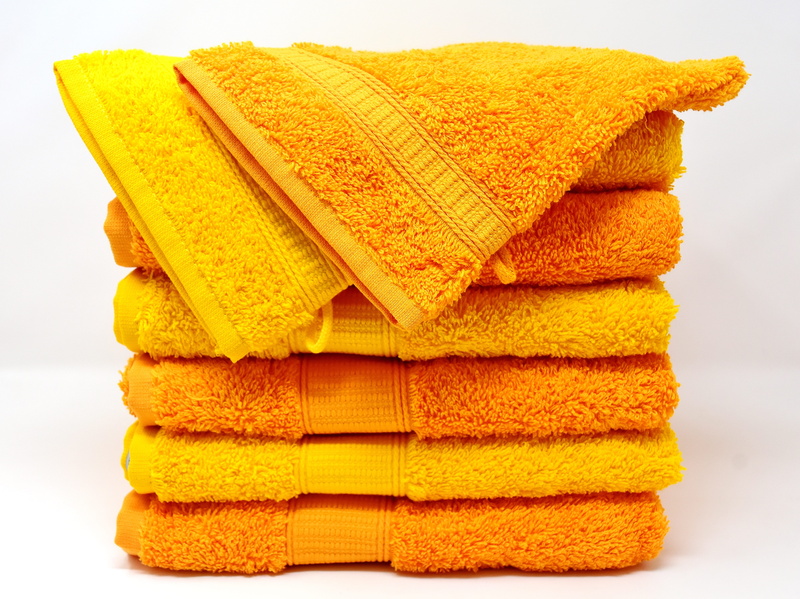 fabric, yellow, no people, stack, snack, terry cloth fabric, food and drink, orange color, background, orange, towels, color, design, textile, stacked