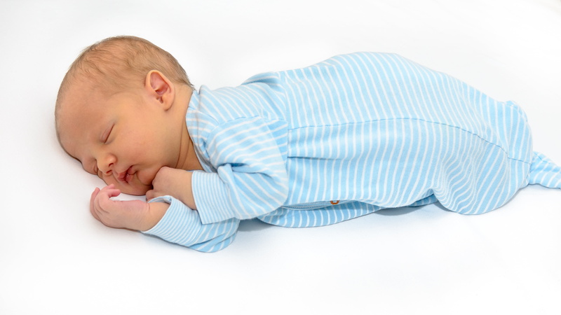 lying down, studio shot, white background, cut out, males, pinstriped, indoors, eyes closed, young, 4K, peaceful, innocence, baby, footies, side view