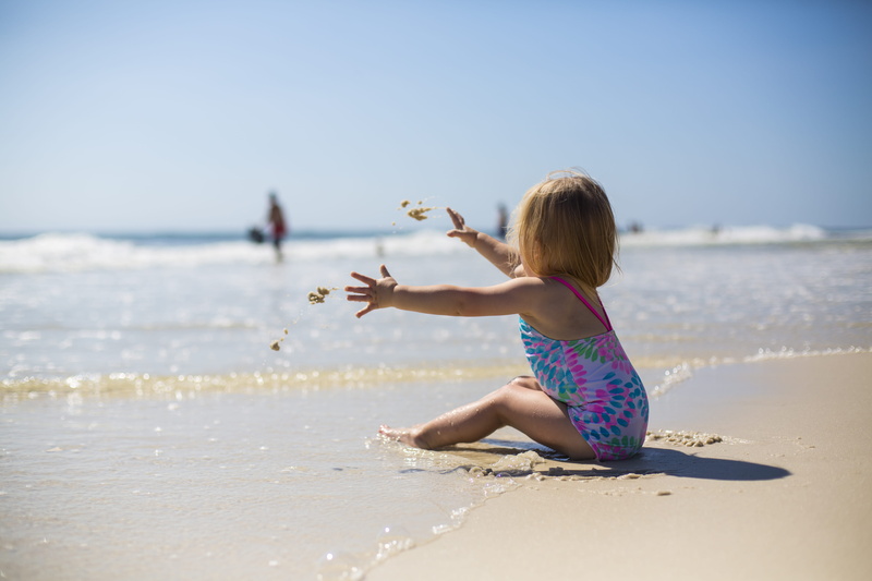 sand, joy, childhood, girls, leisure activity, one person, 5K, day, land, child, innocence, relaxation, seashore, back view, enjoyment, summer, toddler