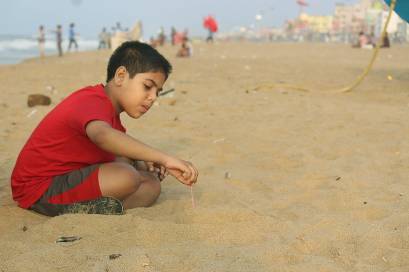 5K, focus on foreground, day, kid, childhood, males, innocence, leisure, vacation, land, coast, incidental people, boys, one person, joy, game, fun, men