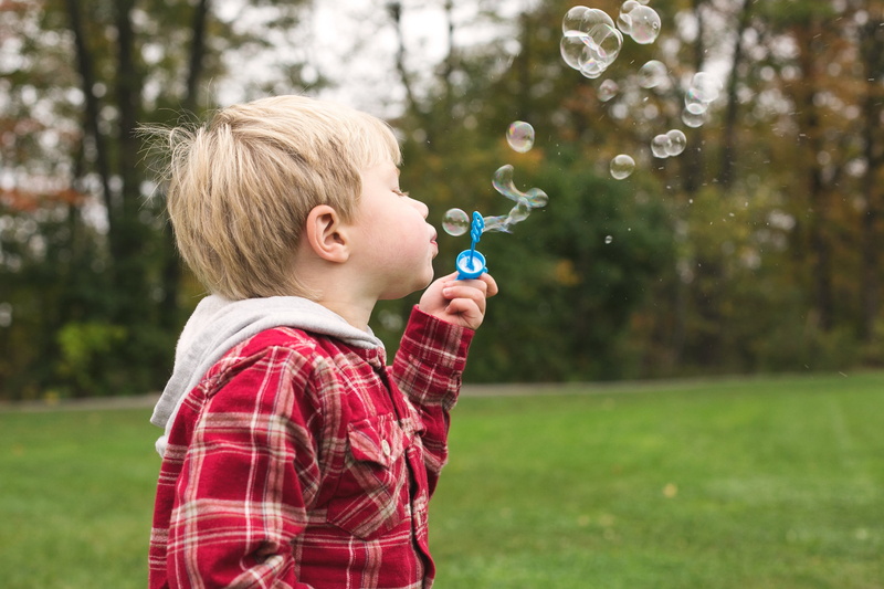 hair, day, males, offspring, bubble, side view, bubble wand, focus on foreground, casual clothing, outdoors, child, Boys, blowing, grass, bubbles, nature
