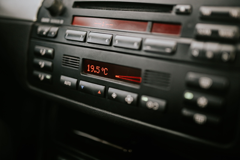 control panel, motor vehicle, electrical equipment, interior, control, arts culture and entertainment, close-up, car, black background, black color, music