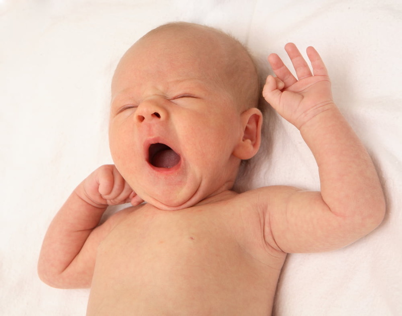 beginnings, indoors, Baby, portrait, cute, lying down, yawning, childhood, young, face, real people, newborn, child, one person, emotion, mouth, shirtless