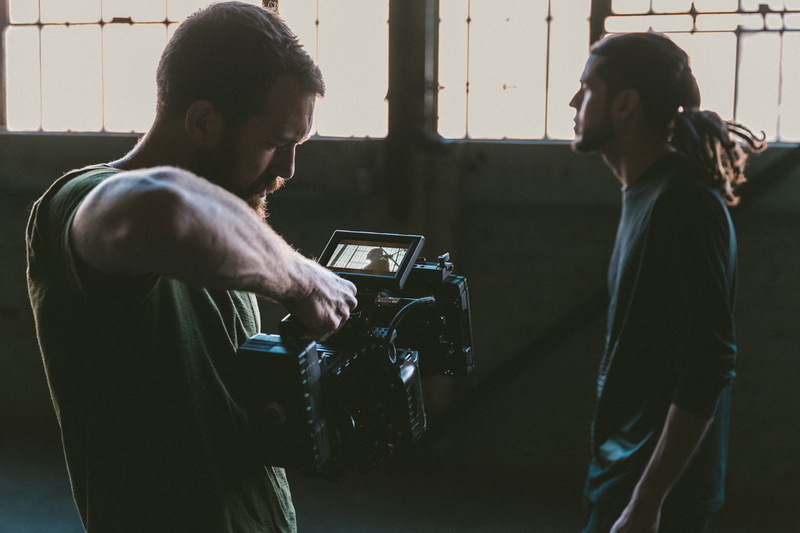 man, photography themes, waist up, lifestyles, men, two people, production, indoors, holding, camera, communication, young adult, movie, activity, 5K