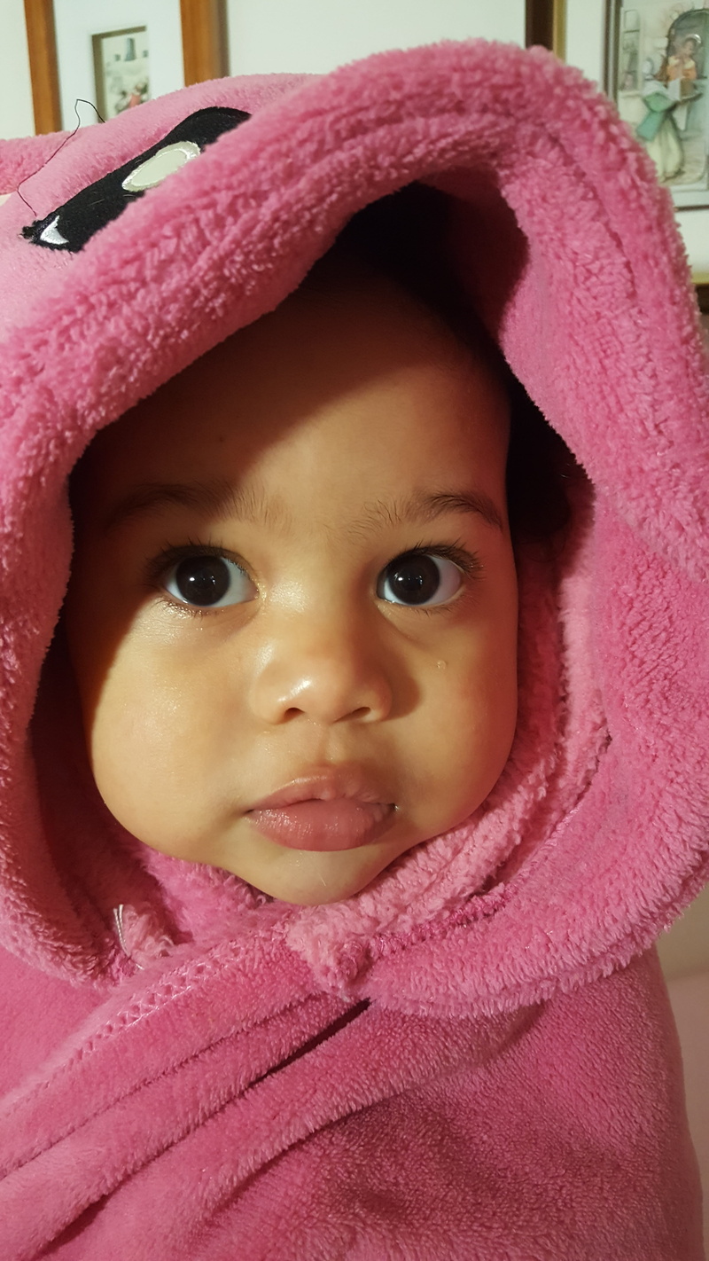one person, hat, human face, close-up, toddler, headshot, warm clothing, clothing, pink color, Pink, babyhood, young, child, cute, front view, little, portrait