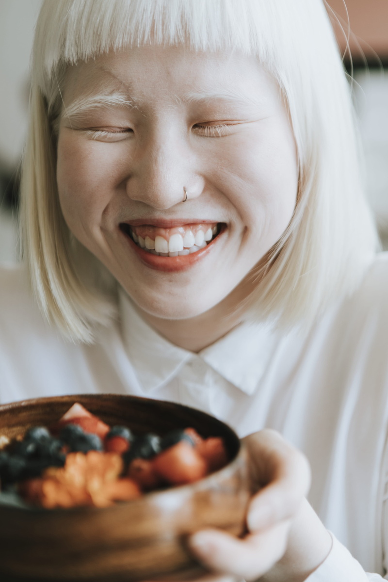 close-up, nose ring, bangs, food, headshot, delicious, one person, fresh, diet, girl, gap toothed, fruits, toothy smile, woman, front view, indoors, holding