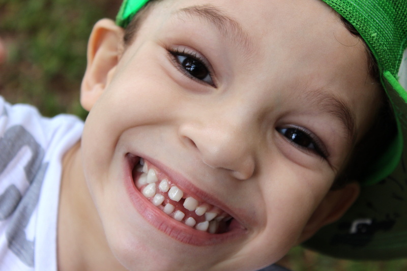 smiling, boy, human teeth, innocence, one person, 5K, gap toothed, kid, green, emotion, toothy smile, happiness, body part, headshot, offspring, looking at camera