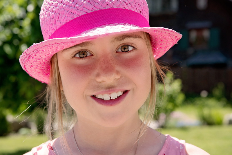 girls, human, looking at camera, one person, innocence, out, cheerful, girl, front view, childhood, hat, women, pink color, emotion, happiness, outdoors