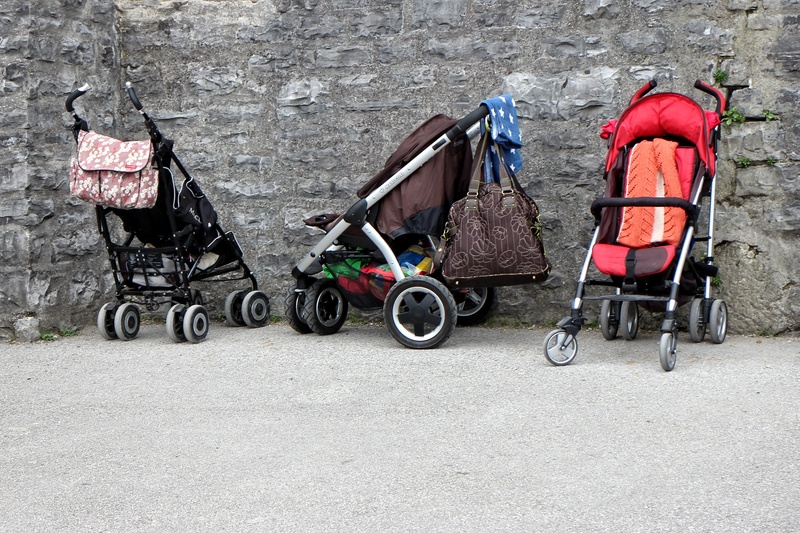 mode of transportation, baby Carriage, child, vehicle, wall, alone, brick wall, buggies, children, three, travel, strollers, wall - building feature, dare