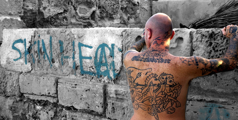 skinhead, shirtless, graffiti, gray, city, craft, day, 4K, text, man, urban, rebellion, creativity, concrete, male likeness, leaning, human representation