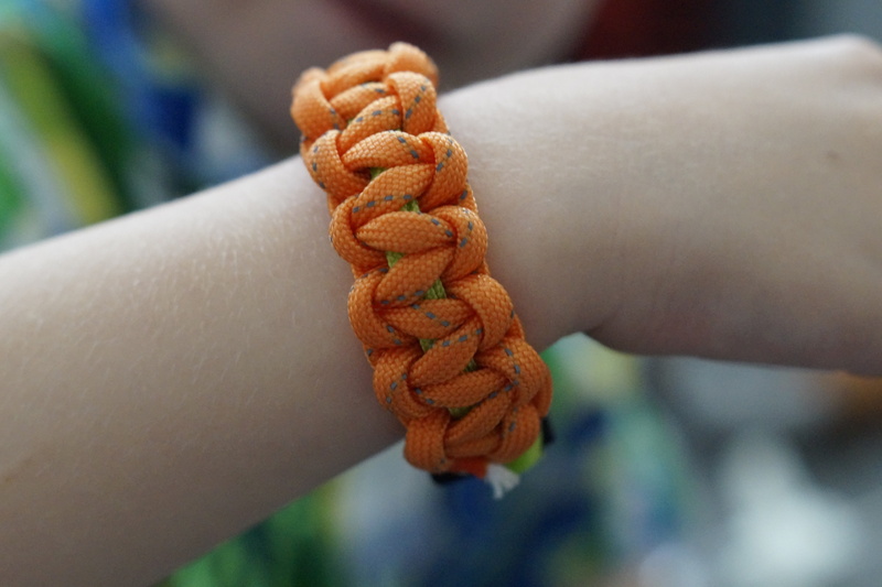 homemade, wrist, complexity, trend, linked, young adult, novelty, outdoors, prisoner, body part, day, 5K, cord, paracord, human limb, focus on foreground