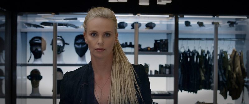 confidence, The Fate of The Furious, portrait, indoors, one person, front view, adult, beautiful woman, consumerism, store, looking at camera, Cipher (Fast and Furious)
