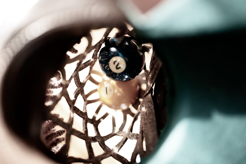 clock, machine, human hand, gear, finger, one person, human face, high angle view, gemstone, gauge, black color, watch, sphere, selective focus, personal accessory