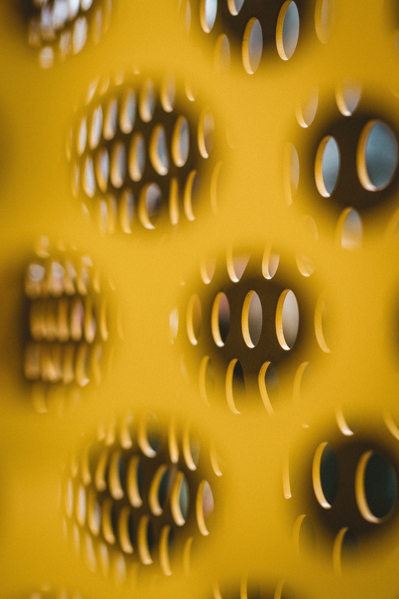 text, indoors, circles, technology, gold colored, no people, metal, cooktop, focus, full frame, gear, machine, machine part, still life, equipment, shape