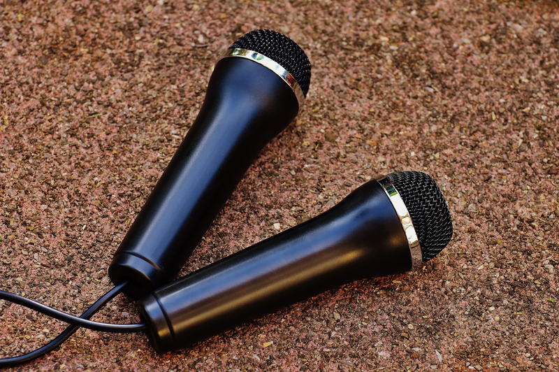 recording, silver colored, no people, singing, performance, sound recording, retro, single object, arts culture and entertainment, audio equipment, plastic