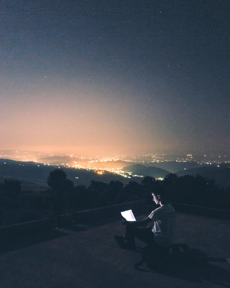 lifestyles, sitting, boy, copy space, adult, male, roof, grainy, person, real people, full length, mountains, light, sunset, men, seat, photography, outdoors