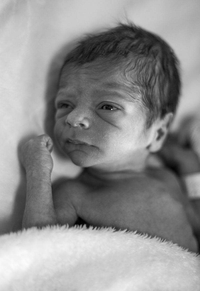 black and white, grayscale, infant, headshot, close-up, looking, cute, young, softness, innocence, newborn, facial expression, photo, baby, face, one person